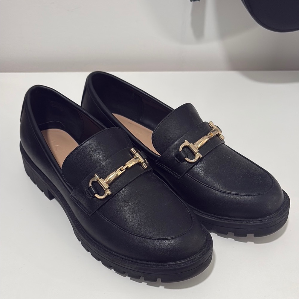 Black Leather Loafers with Gold Accent